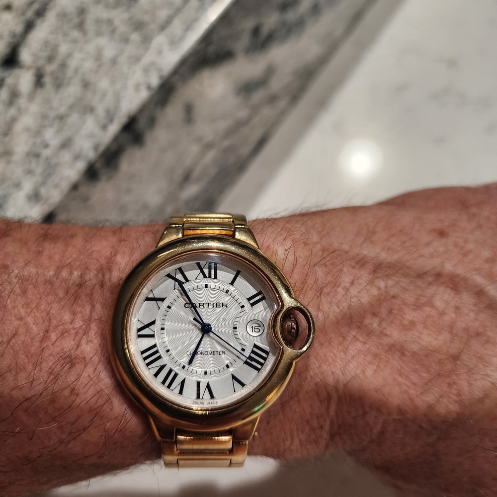 Cartier Gold Watch with White Dial